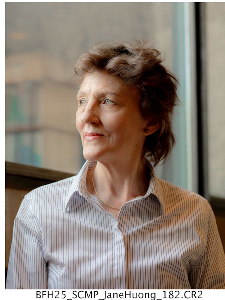 Jane Houng, founder of Becky's Button, looking out of a window
